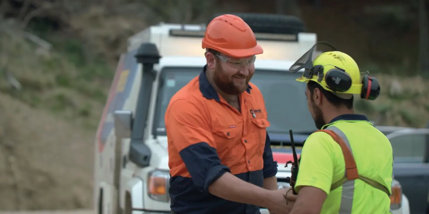 Pirtek technicians on site shaking hands