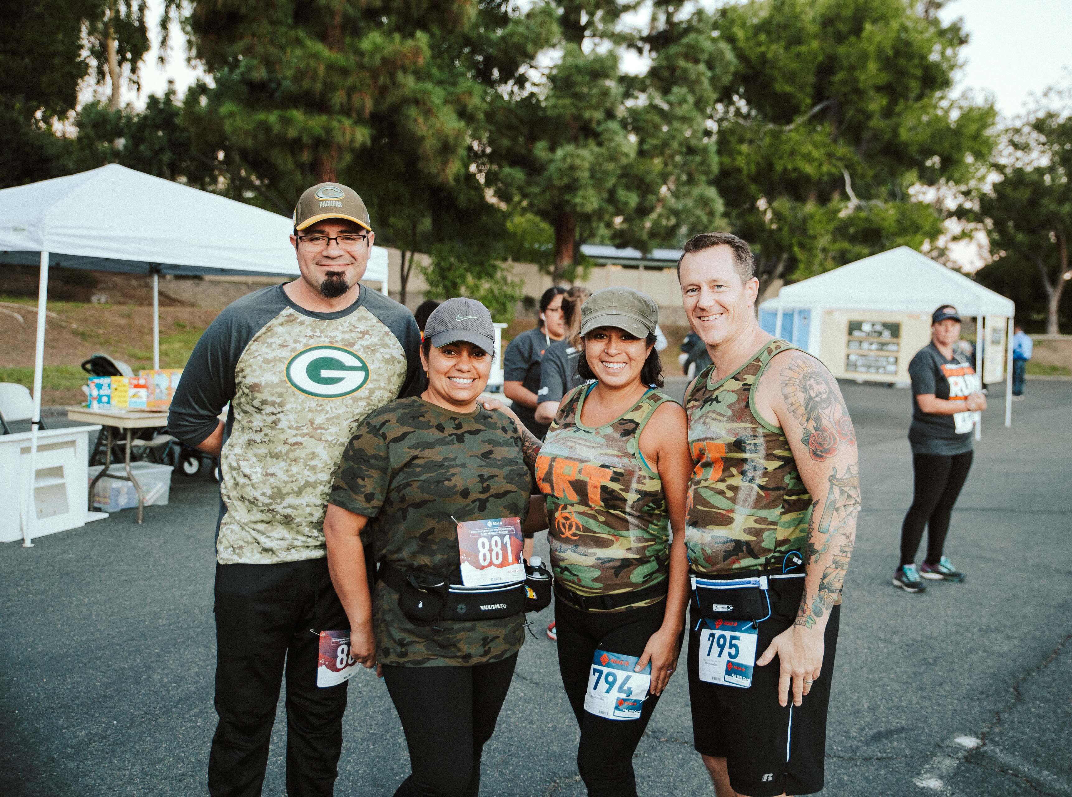Pumpkin Run 5K group of runners wearing camouflage