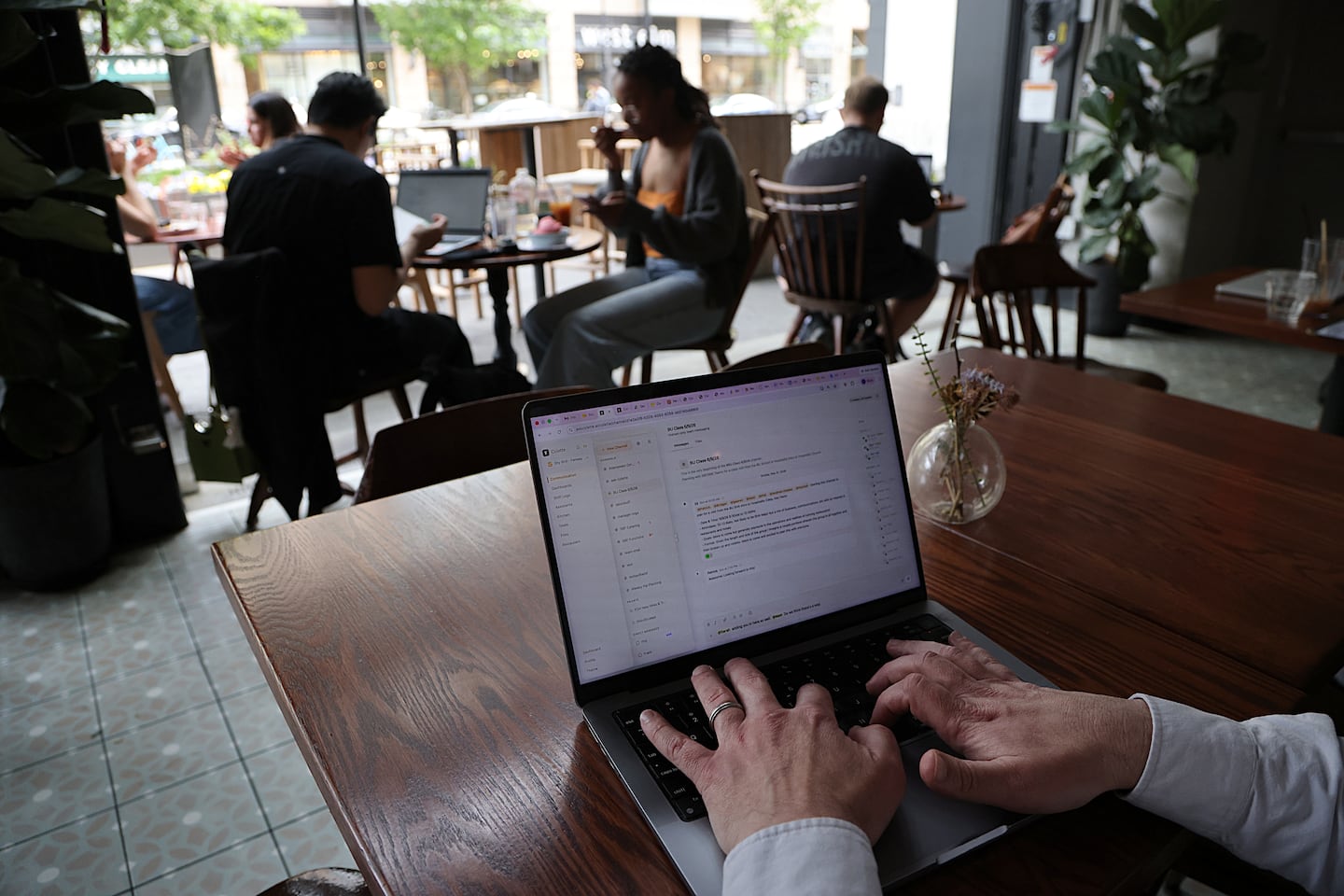 Feldman runs Colette on his laptop from Shy Bird's Fenway location.
