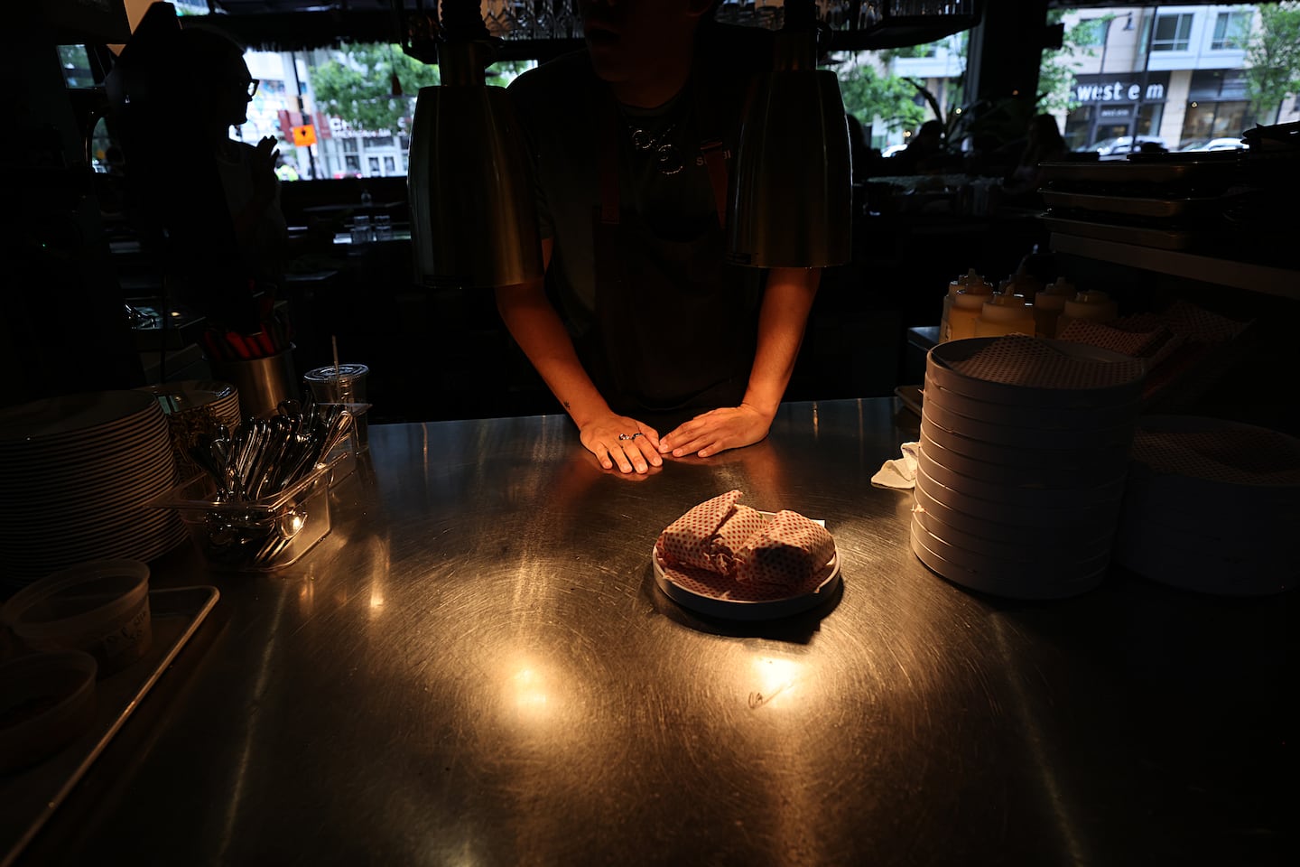 A meal comes out from the kitchen at Shy Bird.