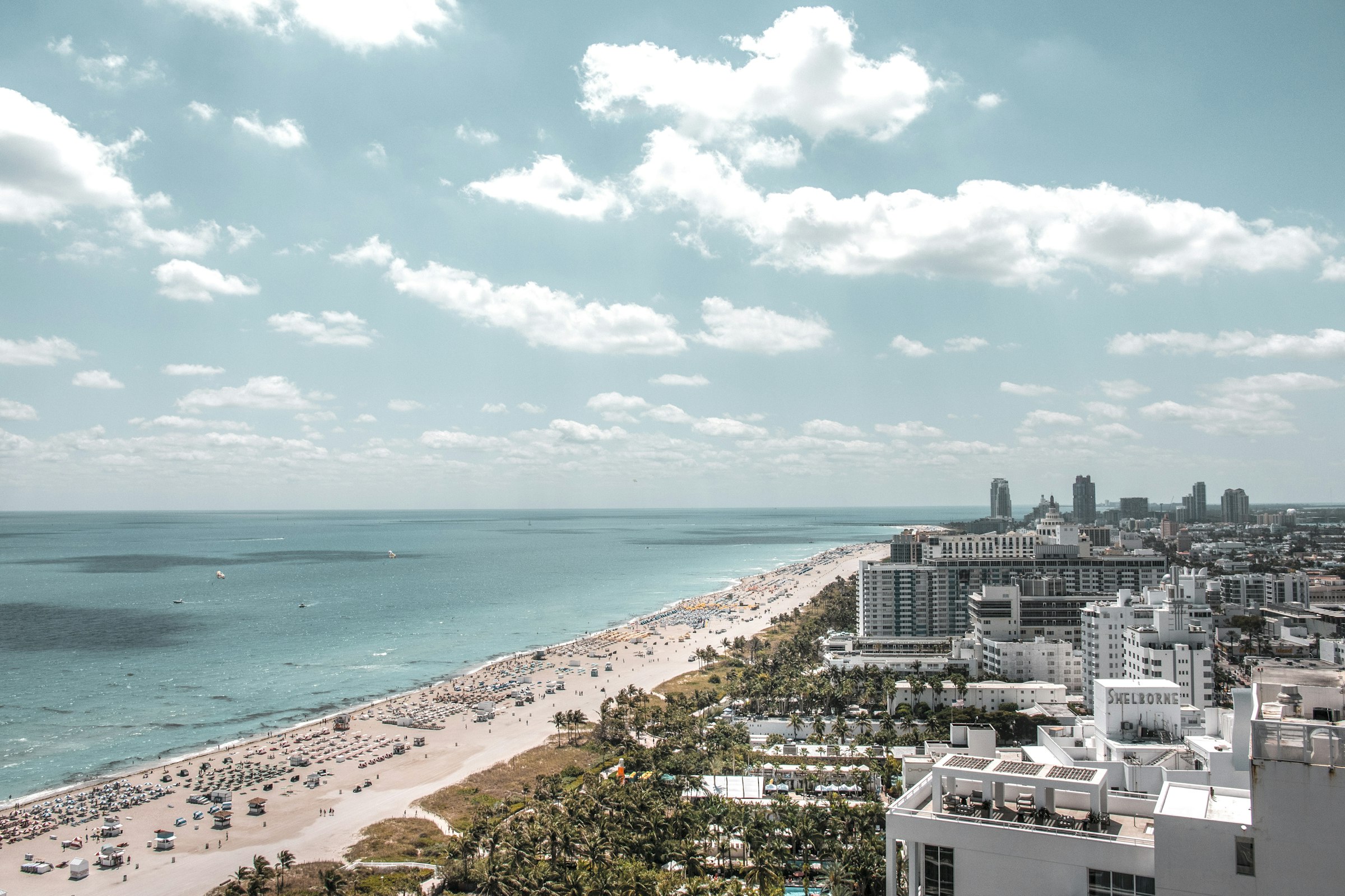 Aerial view of the Miami Beach shoreline and oceanfront towers