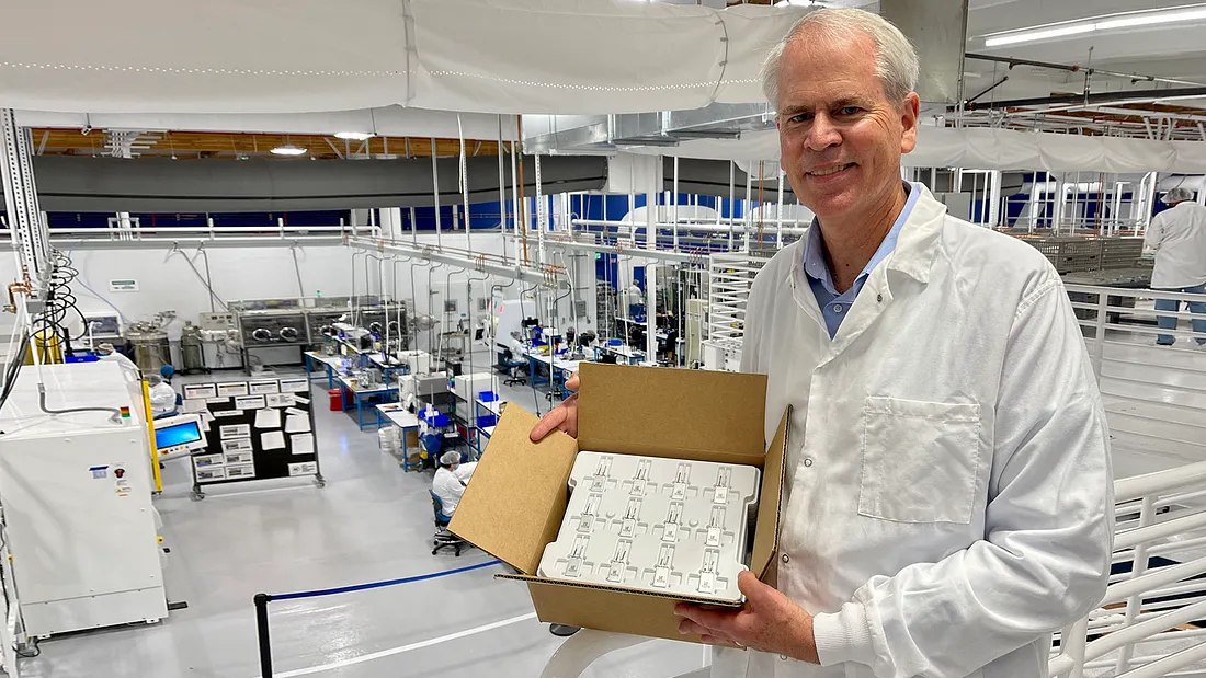 Harrold Rust, Co-Founder, President and CEO, with Enovix's first shipment of commercial cells