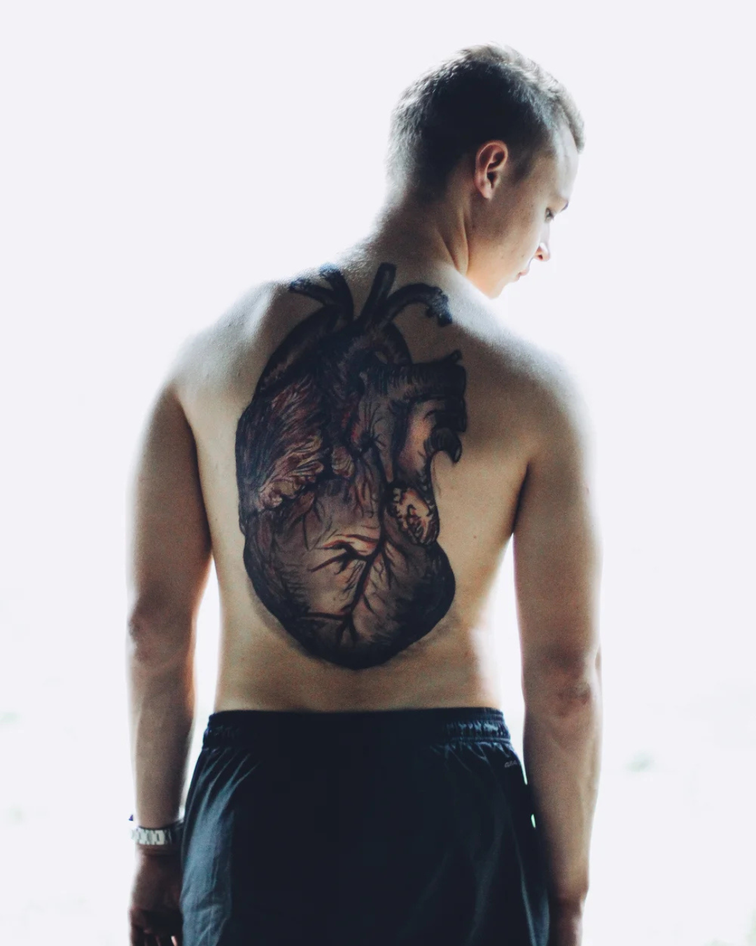 Make up art by Sam Budiartho of an anatomical heart on someone's back.
