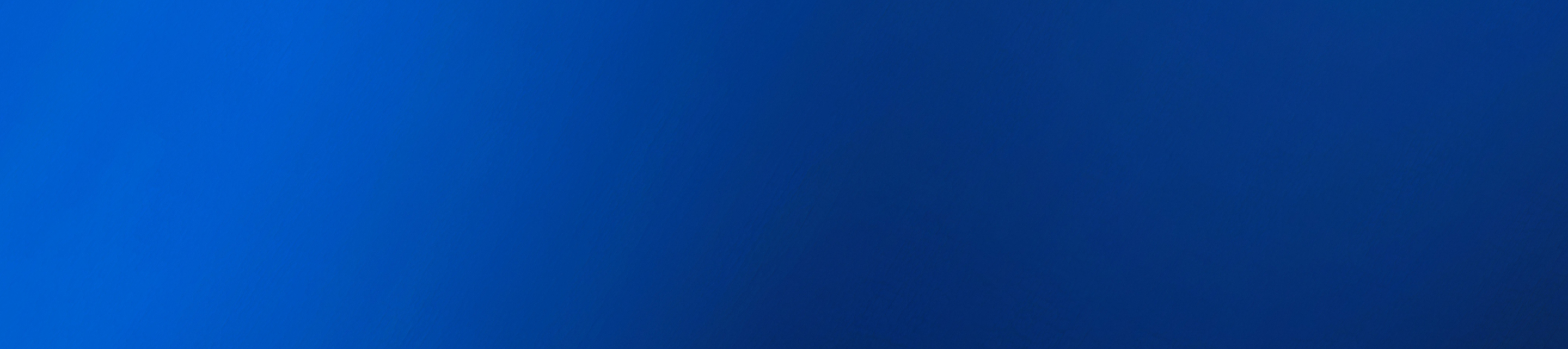 Abstract blue gradient background with smooth texture.
