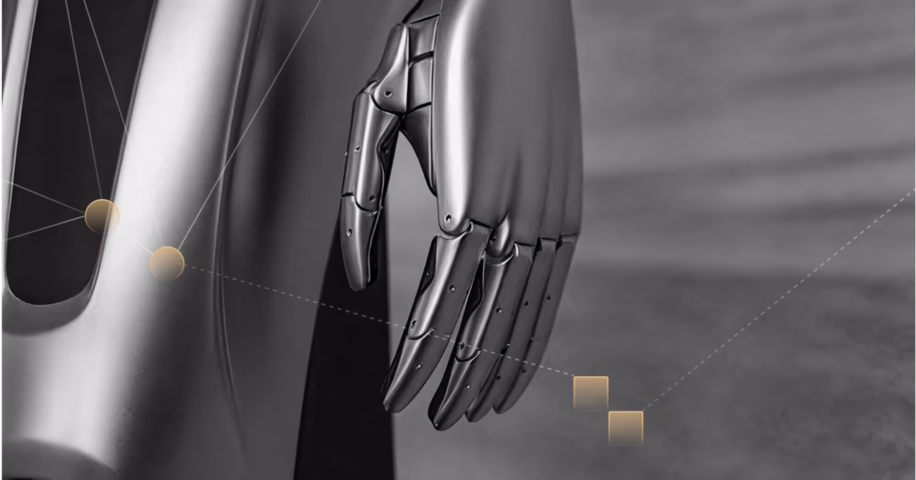 Close-up of a metallic robotic hand with mechanical joints and highlighted connection points.