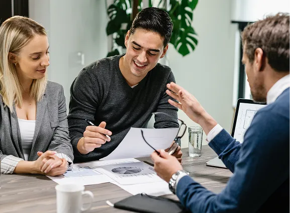 PEGS 360 team discussing employee benefits strategy