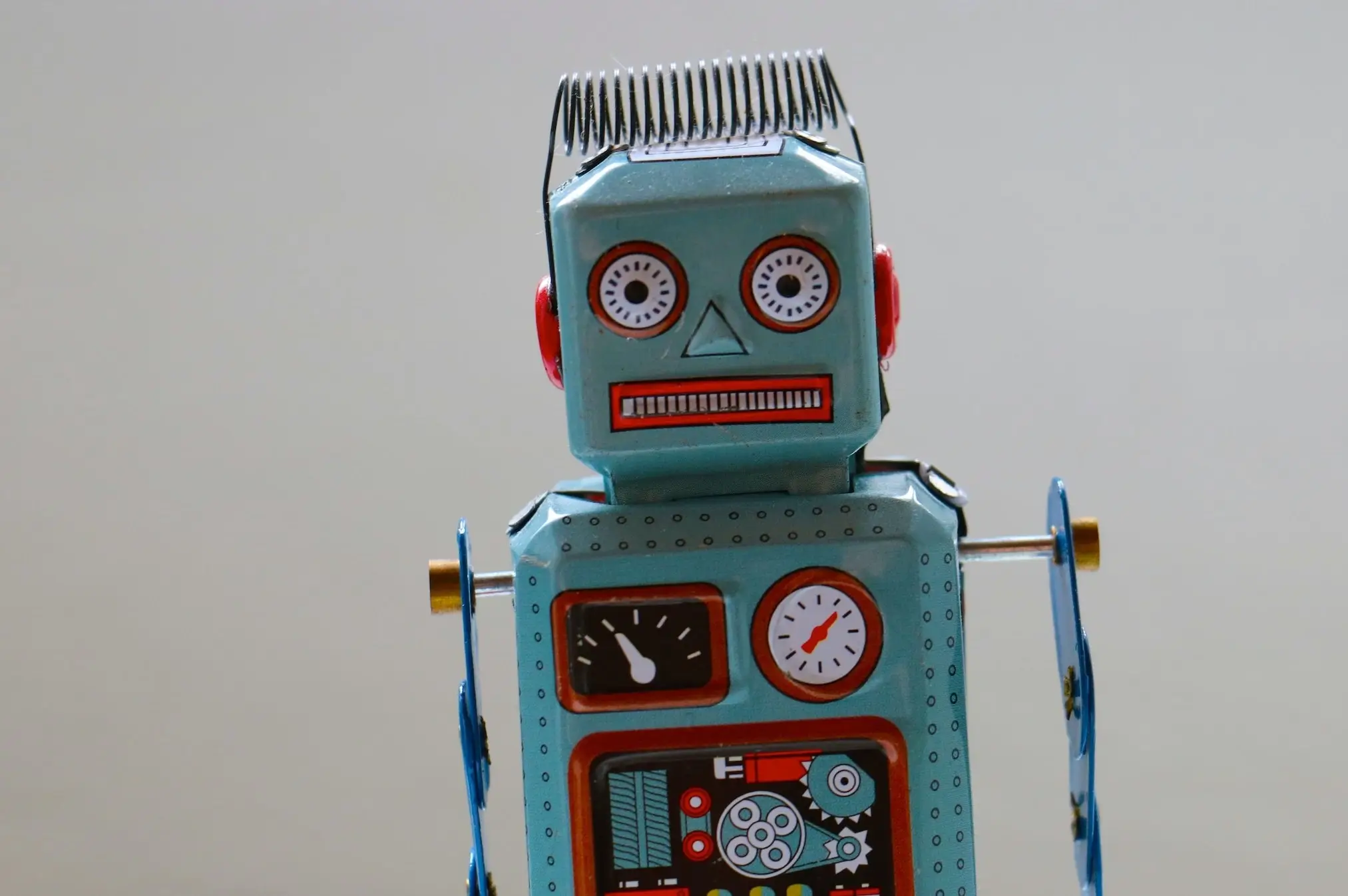 Toy robot symbolizing, satirically, the importance of using emerging technology to drive efficiency in procurement and purchasing.