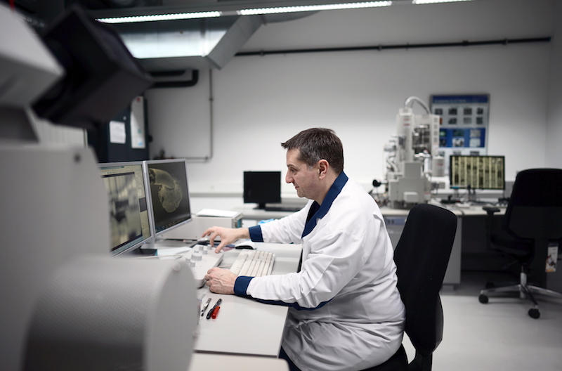 A person working in the iot security labs