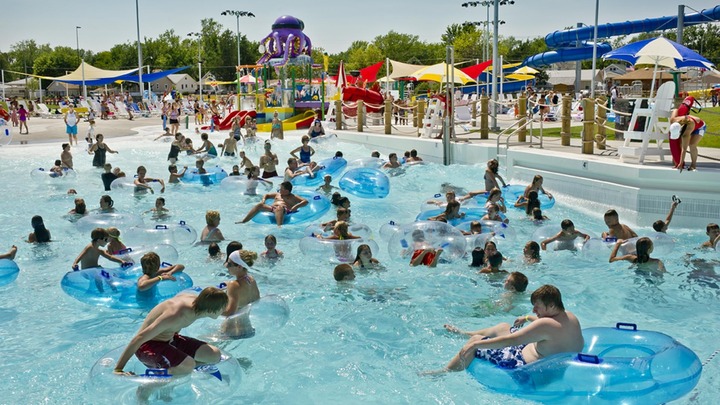 Kids in pool on intertubes