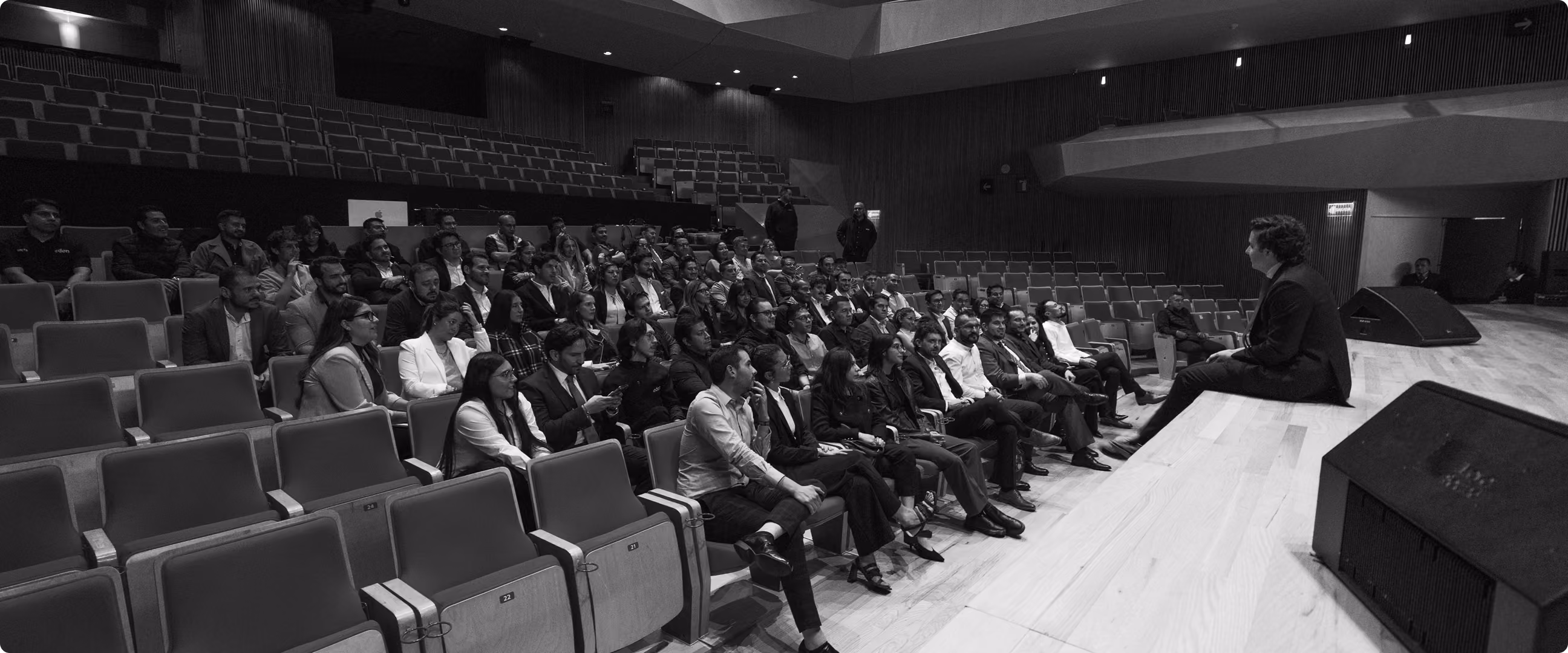 Audience gathered in an auditorium
