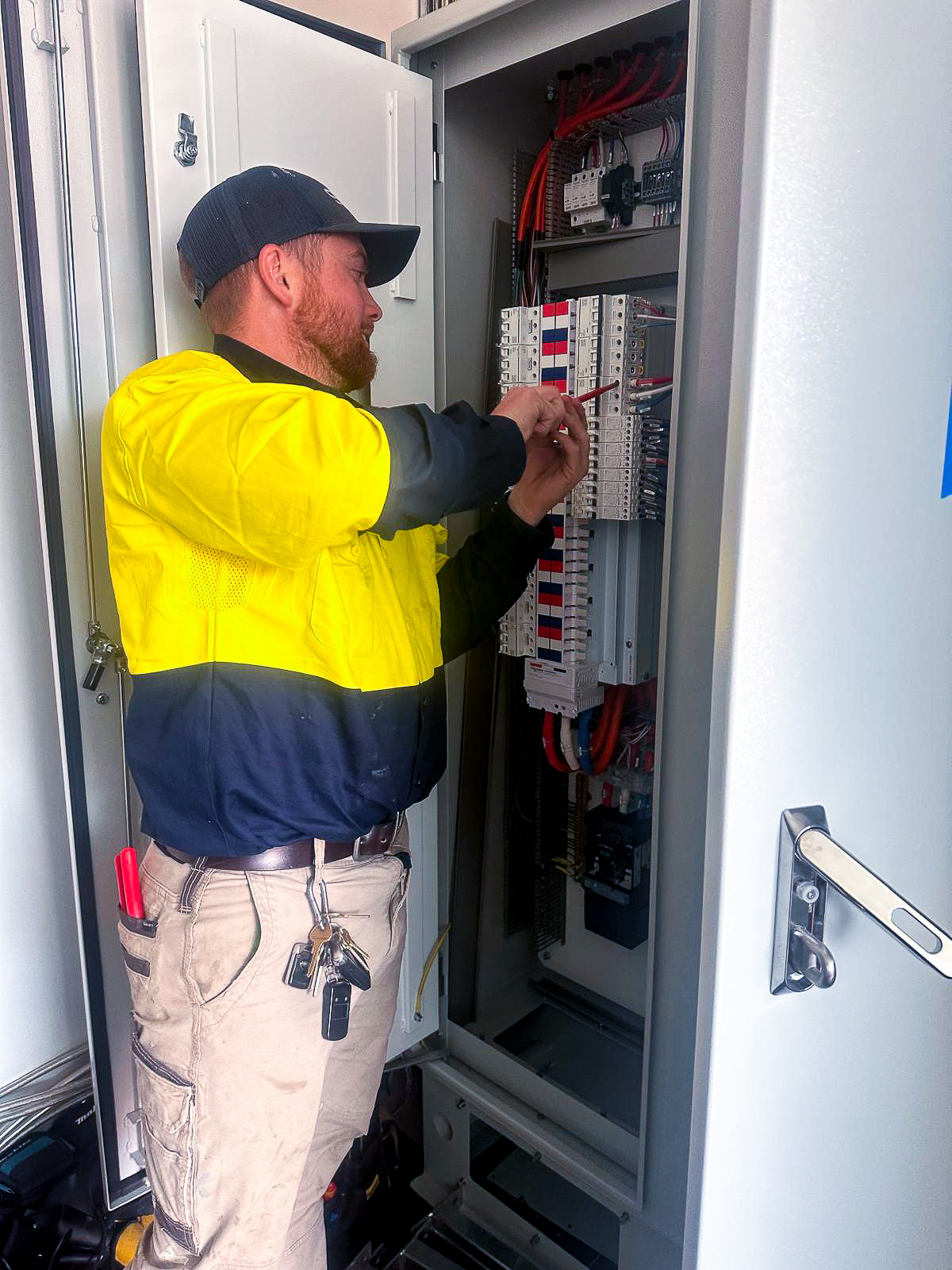 image of a technician installing solar panels