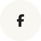 Facebook icon with lowercase 'f' inside a light beige circle.