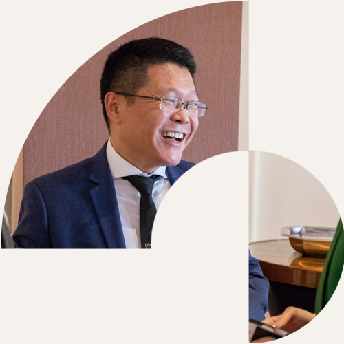 IPG member laughing during a conference session