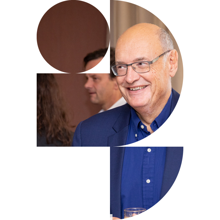 Smiling IPG member at a conference reception
