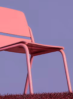 Close-up of a pink metal chair on purple grass with a purple sky background.