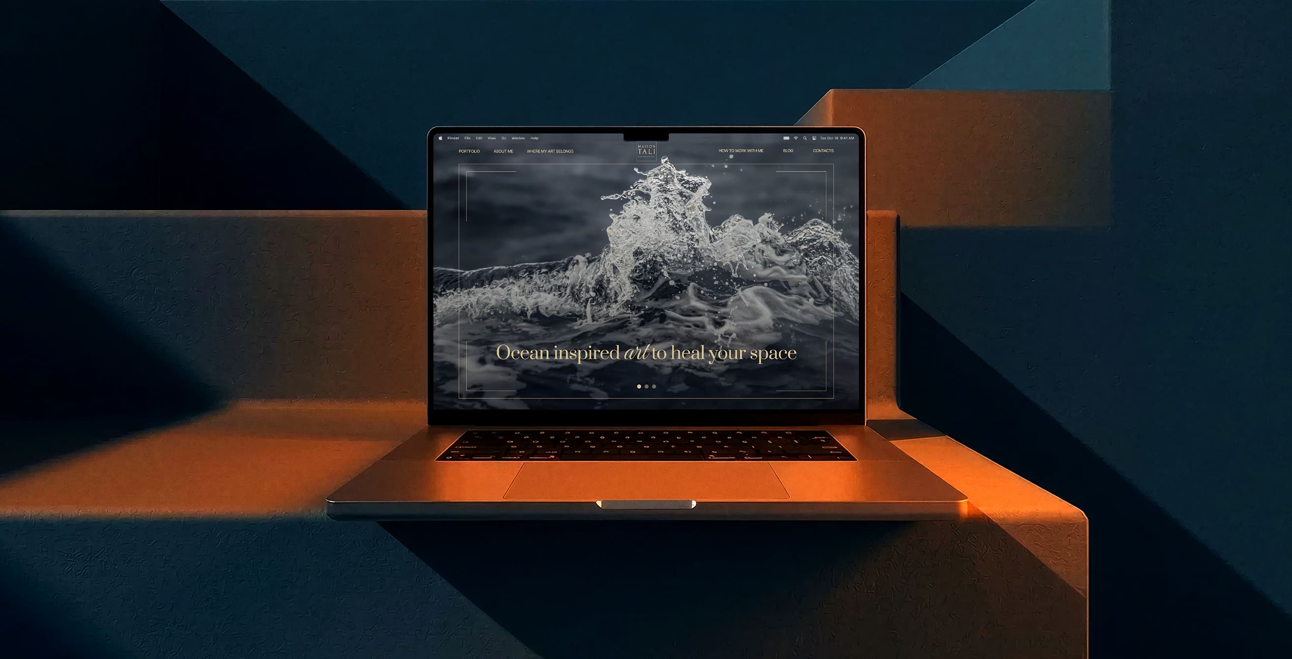 The Maison Tali site open on a laptop, its ocean-wave homepage filling the screen