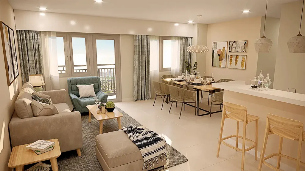 Modern living room and dining area with beige sofa, blue chair, wooden table, and bar stools by kitchen counter.