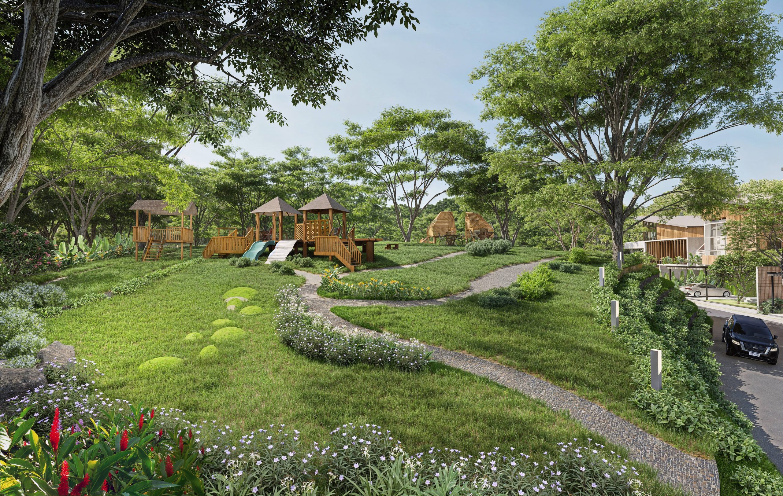 Green park with wooden playground, slides, pathways, flowers, trees, and nearby modern houses and cars.