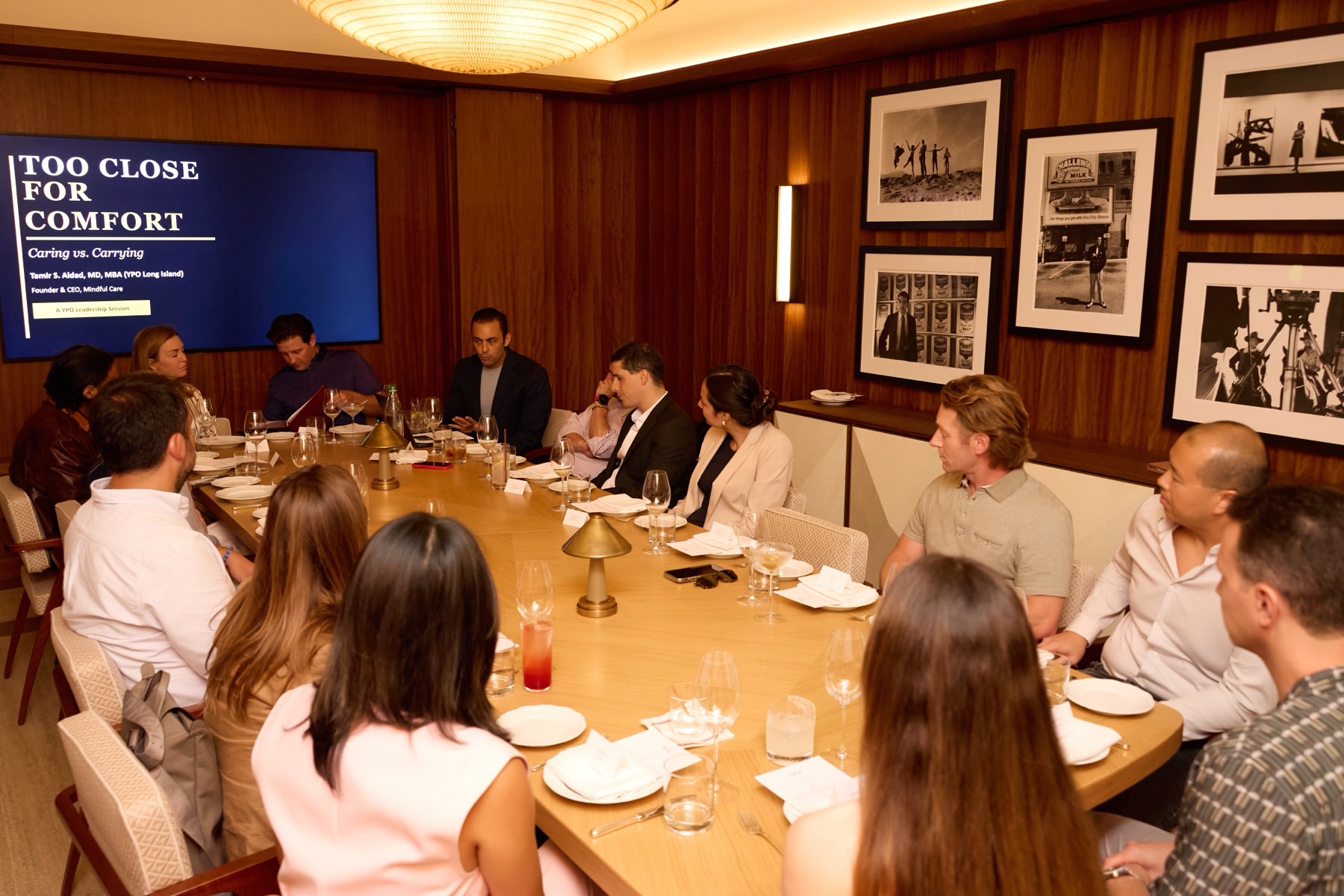 Dr. Tamir Aldad in conversation at a YPO leadership dinner