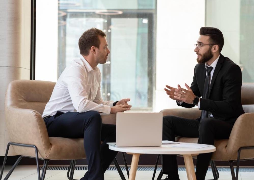 Financial services advisor meeting with a client.