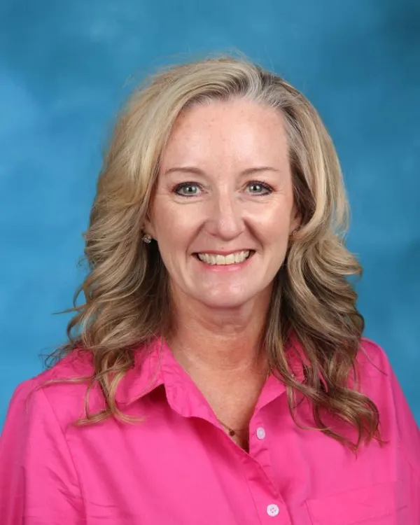 Tiffany Adami smiling in a professional staff portrait