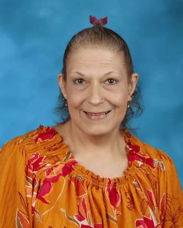 Tanya Mallinson smiling in staff portrait photo