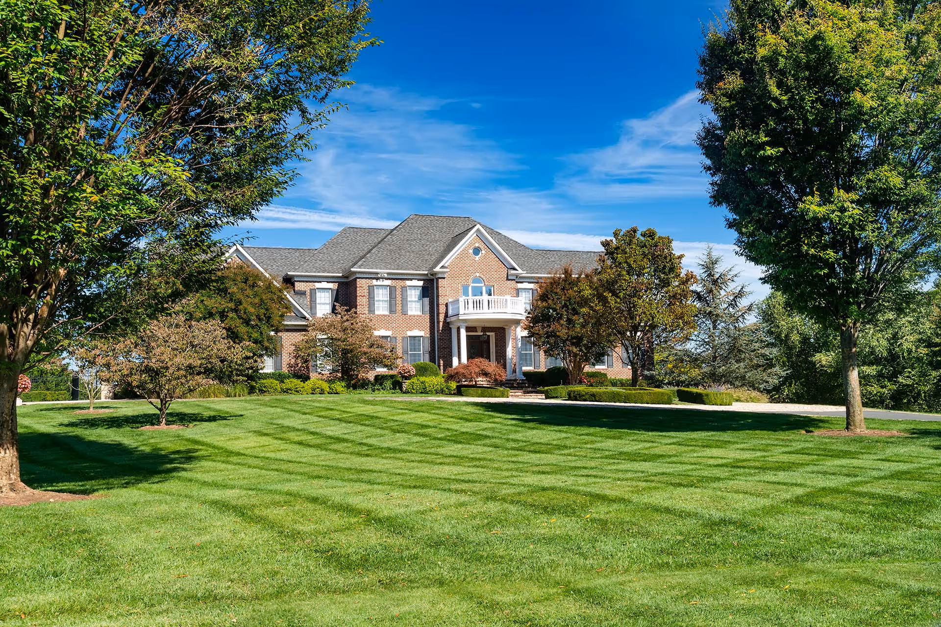 Healthy residential lawn maintained with lawn care treatments by Lawnguard Services