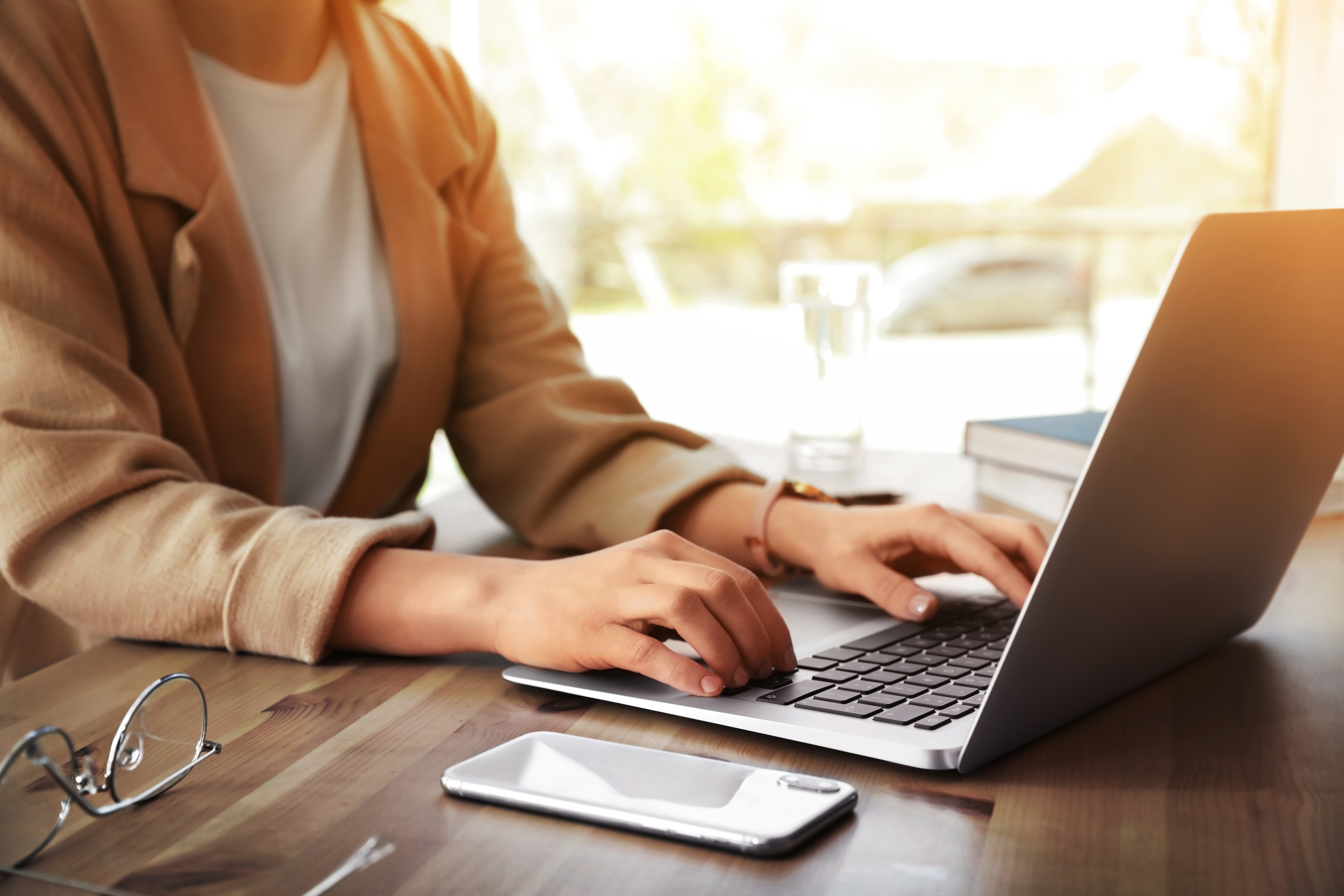 Woman using laptop stock photo
