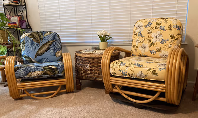 Rattan chairs and couch raised on a custom wooden platform