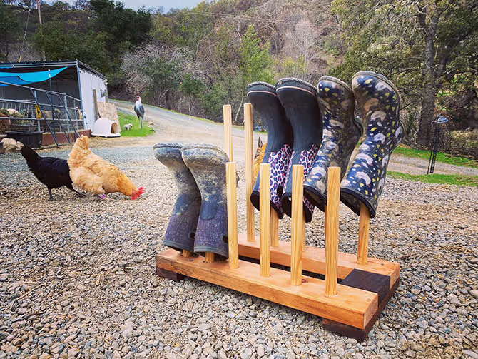 Handcrafted wooden boot drying rack built by the PVE Termites woodworking group