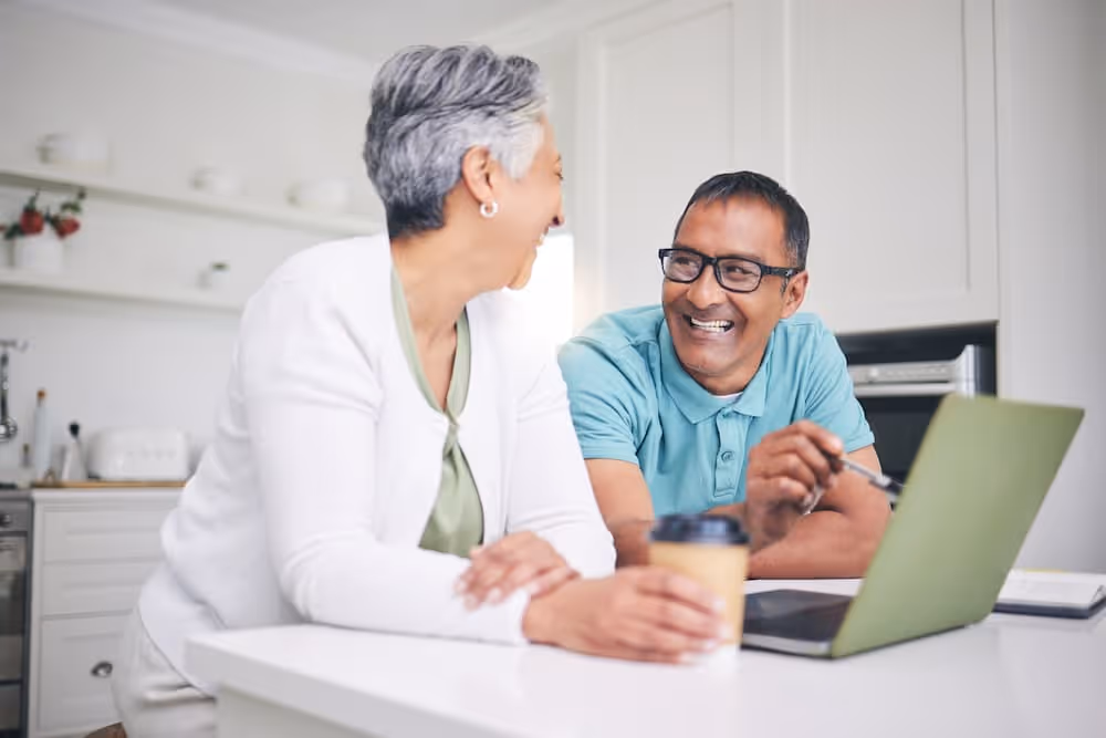 Senior couple reviewing Life Plan Community information together