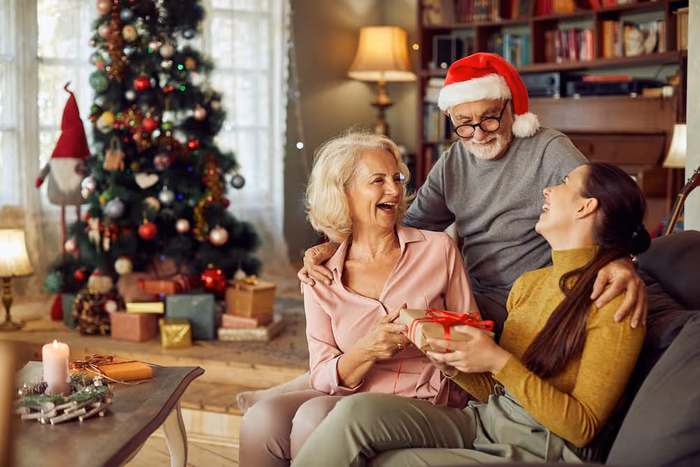 Adult child spending time with an aging parent during the holidays