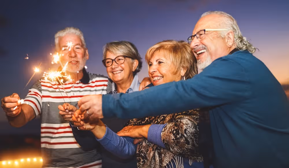 Senior writing New Year's resolutions for a healthier year ahead
