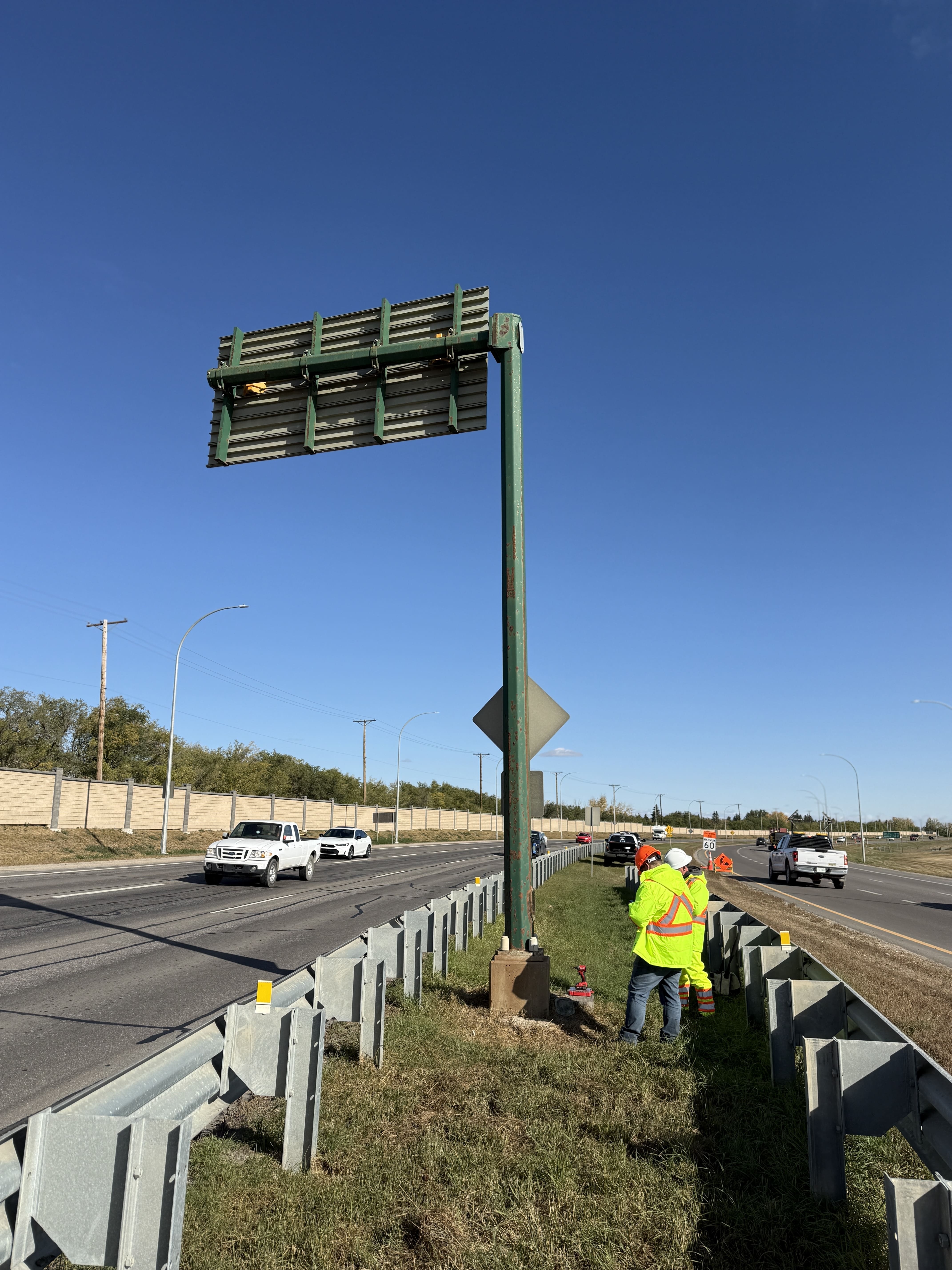 Roadside overview for sign support alignment and access.