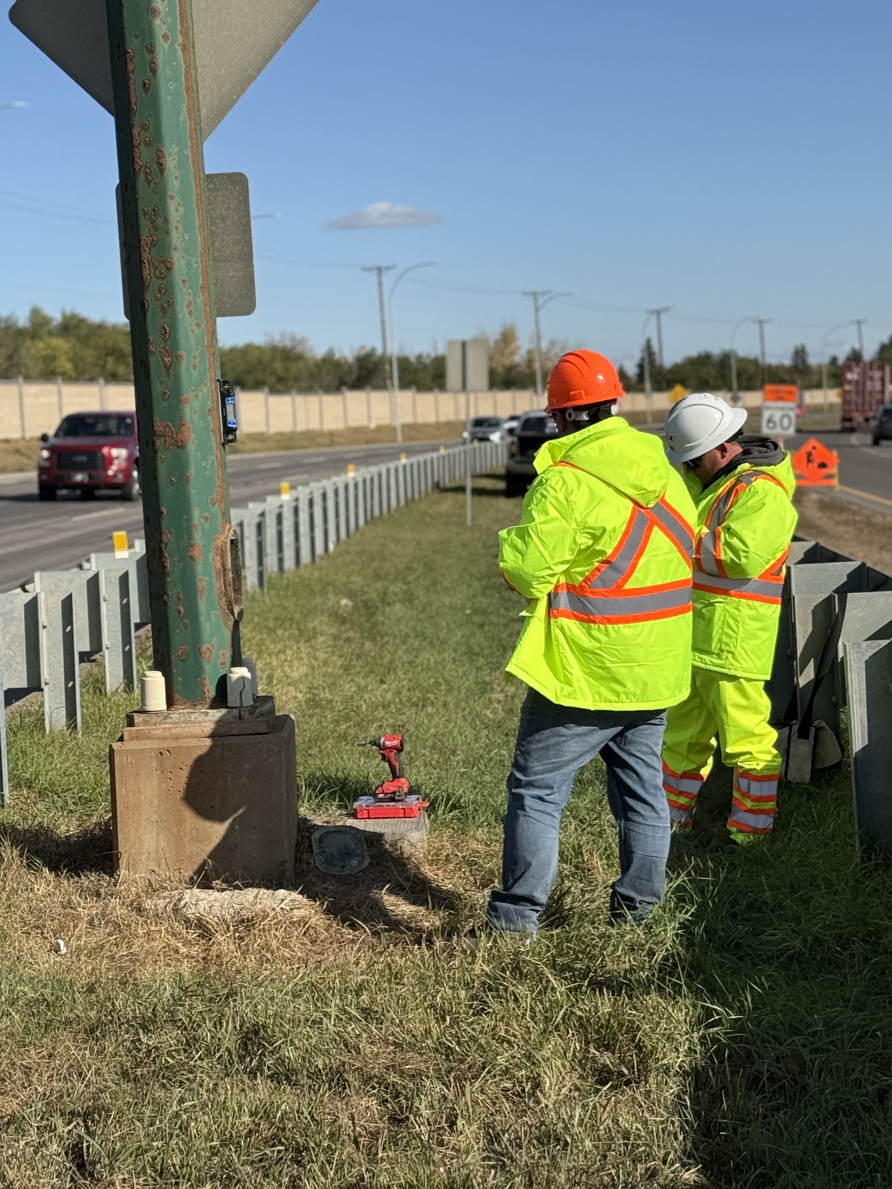 Pole base review for anchor bolts, grout, and corrosion.