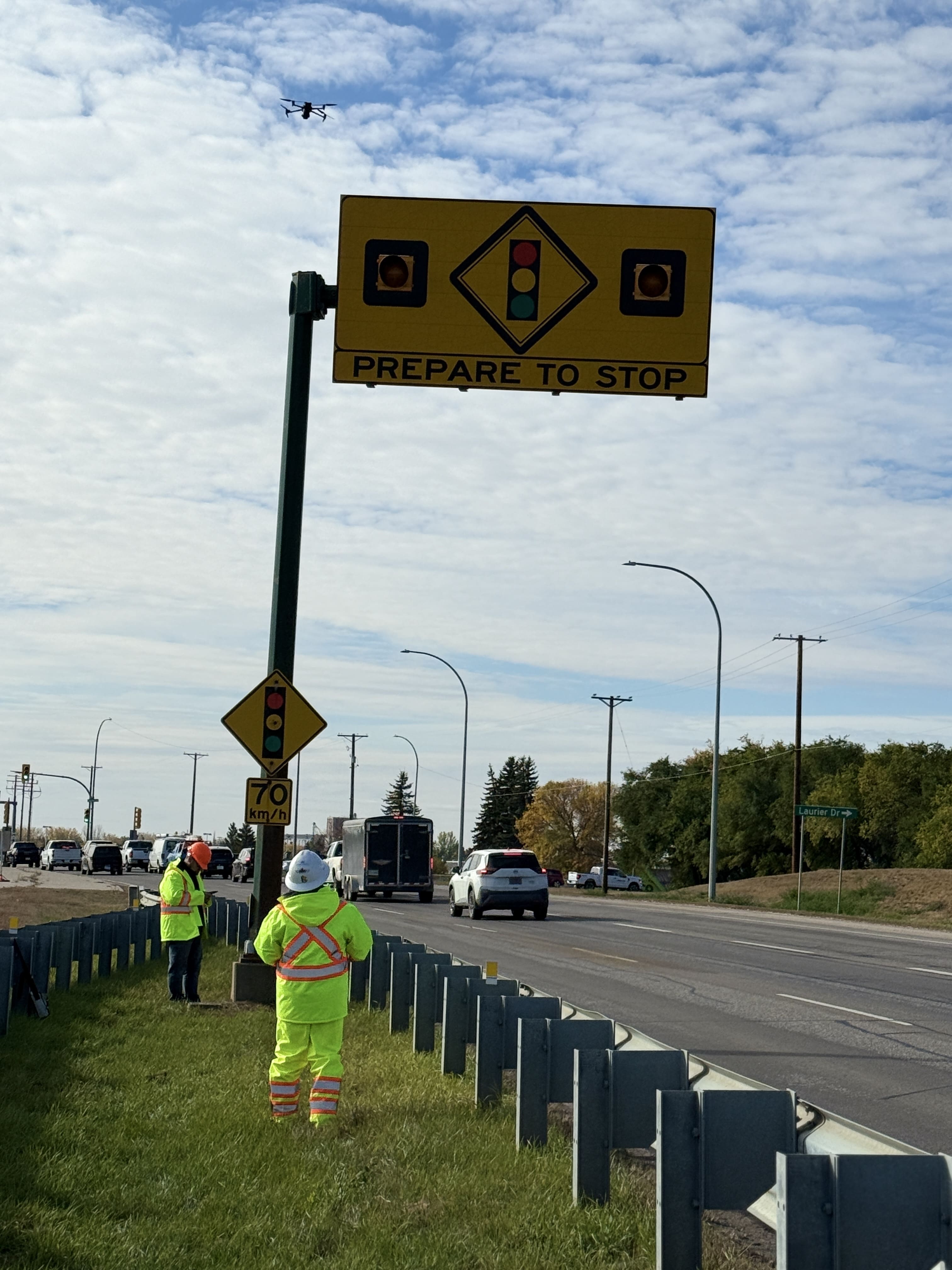 Warning sign support assessment from the roadside shoulder.