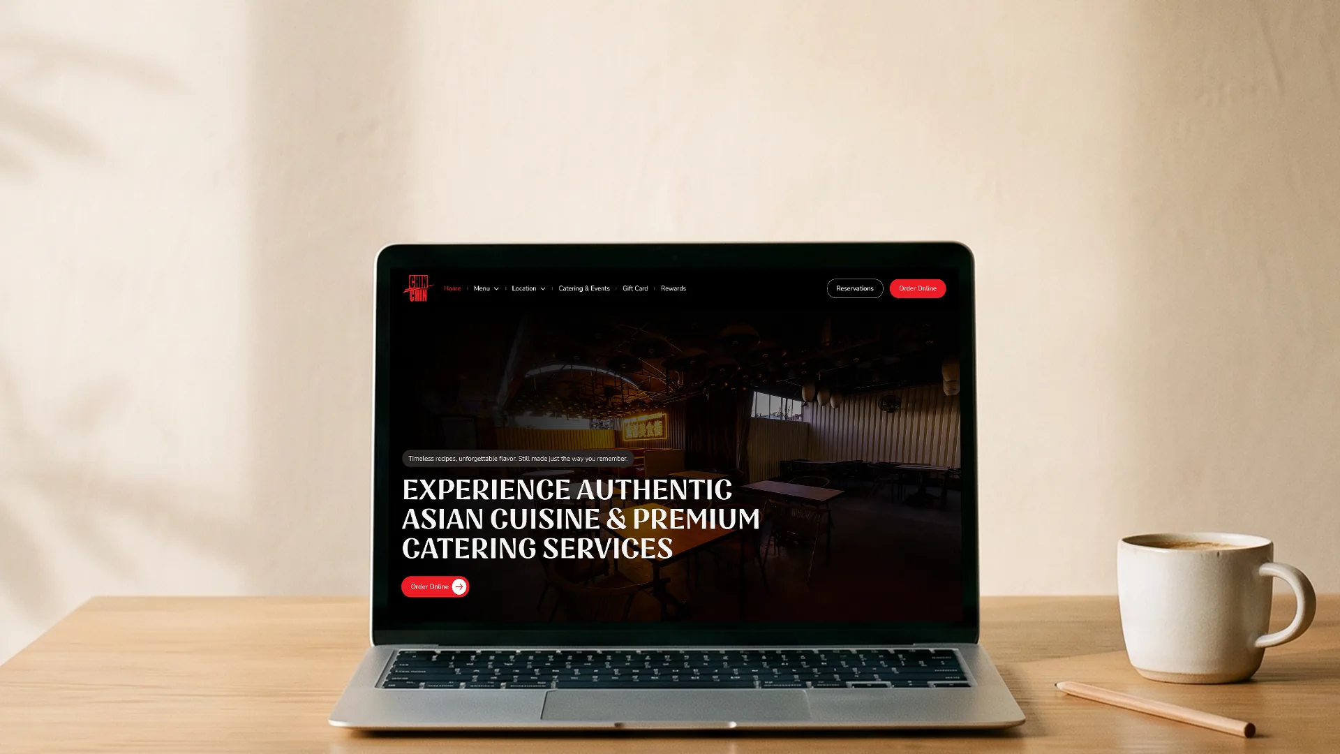 Laptop showing the Chin Chin restaurant website home page