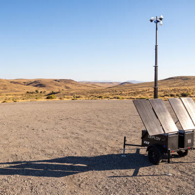 A power trailer in the desert.