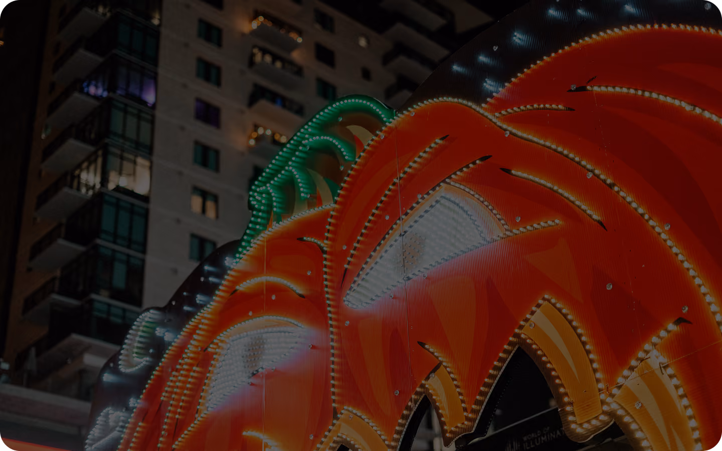 Giant illuminated red and green display built by World of Illumination Studios