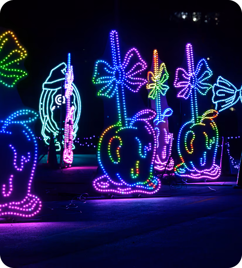 Neon lollipop and candy light displays along the drive-through route