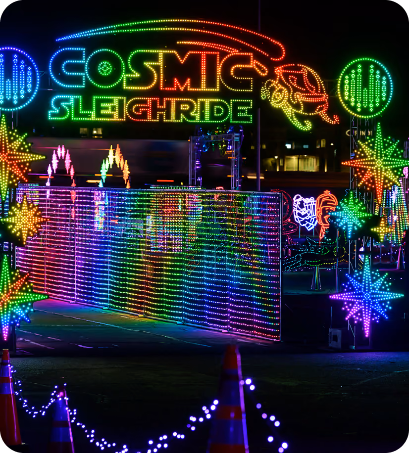 Illuminated Cosmic Sleighride entrance sign