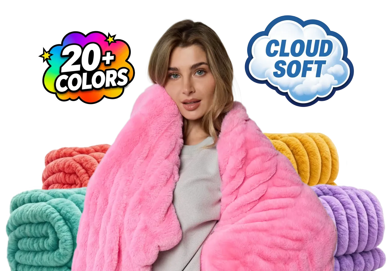 Woman wrapped in a pink Dreamer Blanket in front of a stack of blankets in many colors. 20+ colors. Cloud soft.