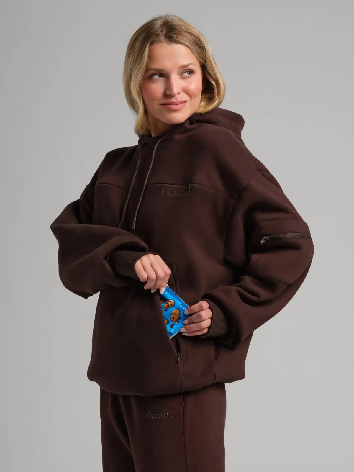 Customers wearing the Snak Hoodie