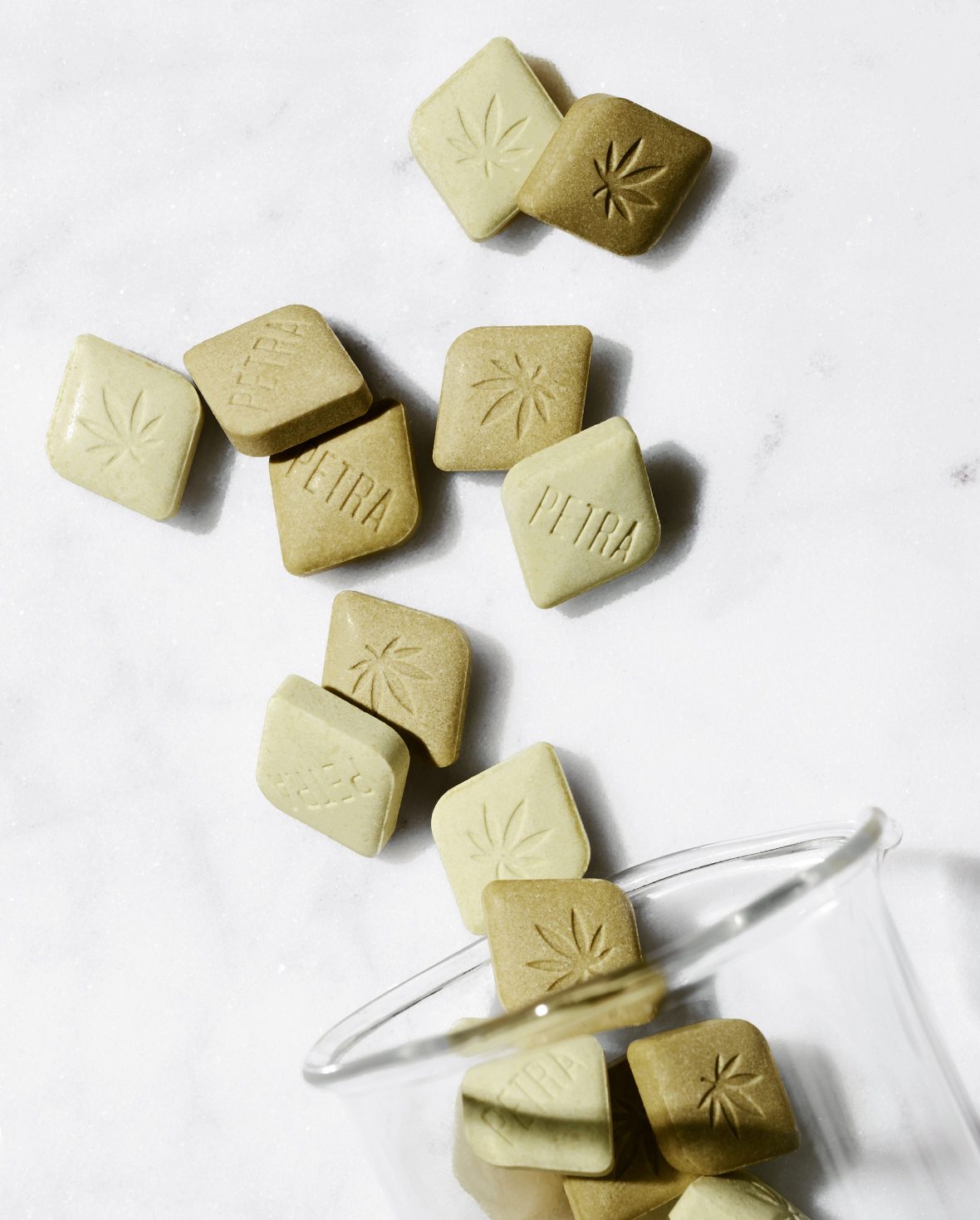 Petra microdosed cannabis mints on a nightstand