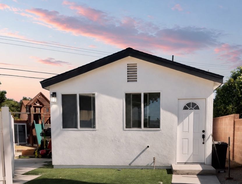 Buena Park ADU construction with white exterior and dark trim, Orange County
