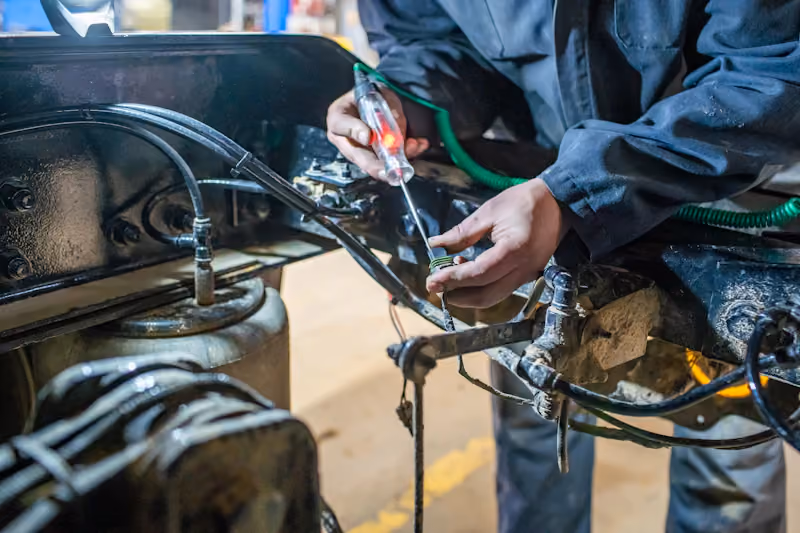 Diesel mechanic performing truck repair in Alabaster, AL