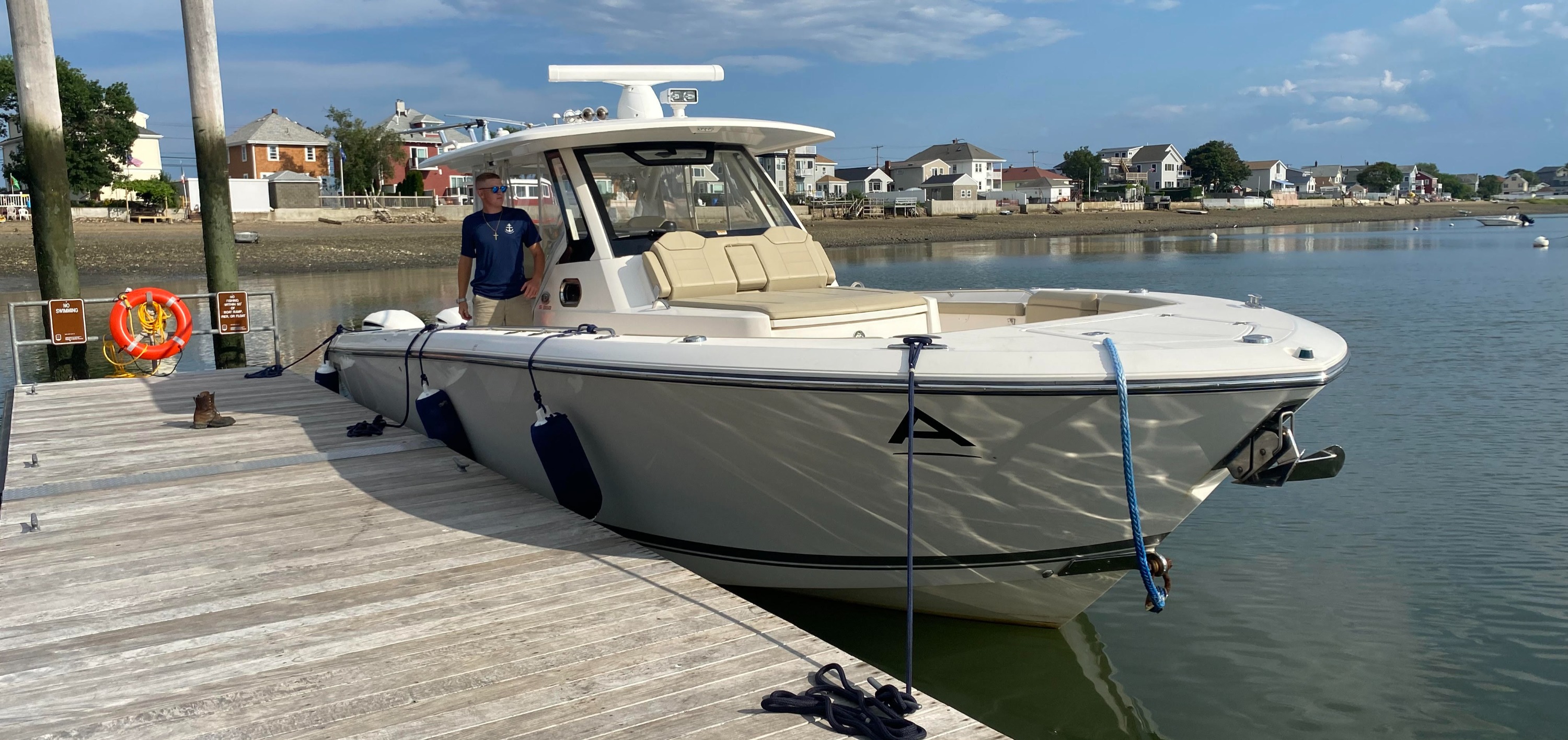 Marine technician servicing a boat