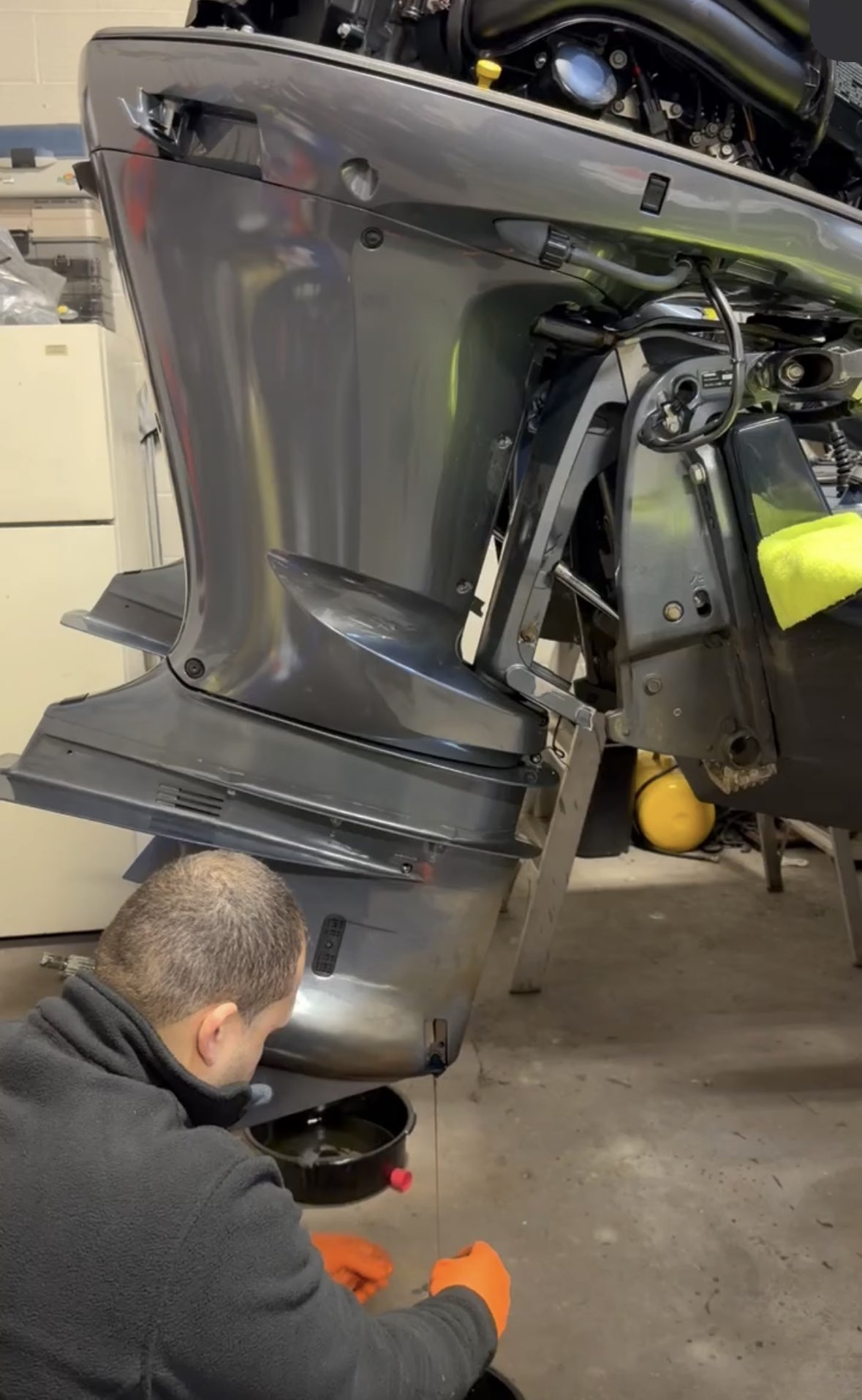 Marine technician servicing a boat