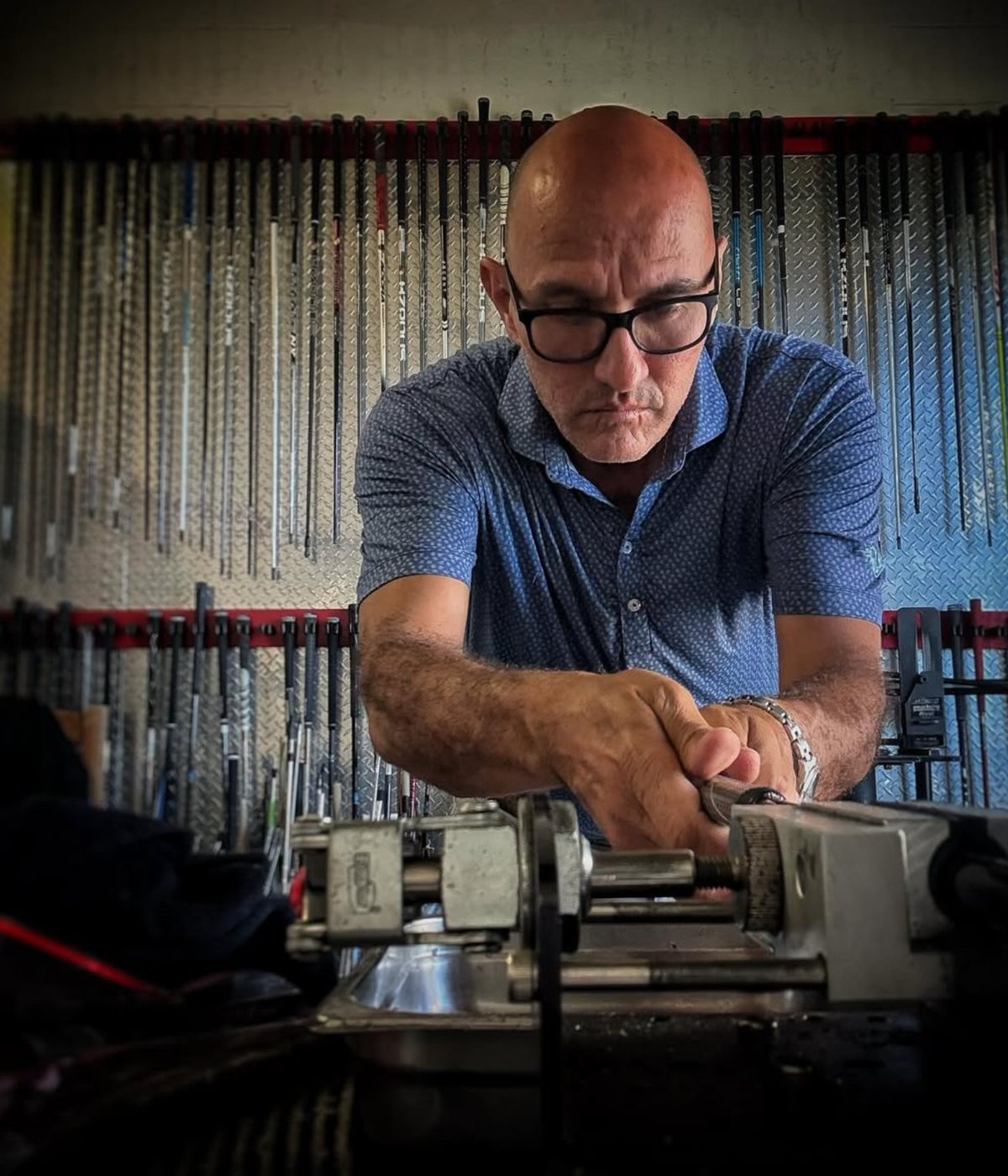 Juan Gomez at his workbench