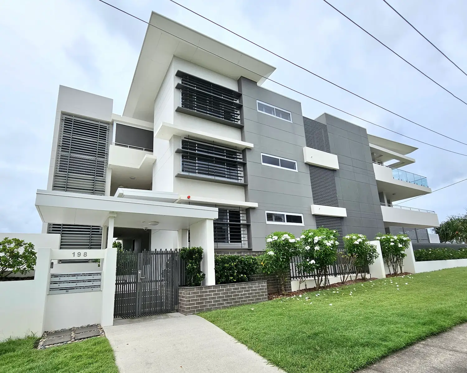 Exterior painting and protective coating on strata complex